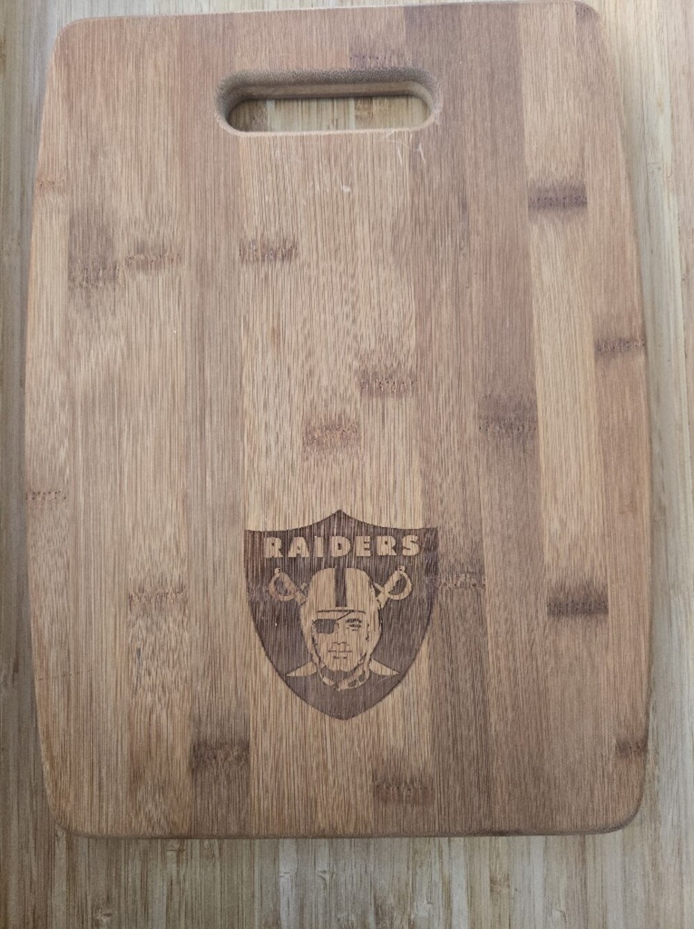 Engraved Oak Wood Cutting Cuttery Board with Raiders Logo